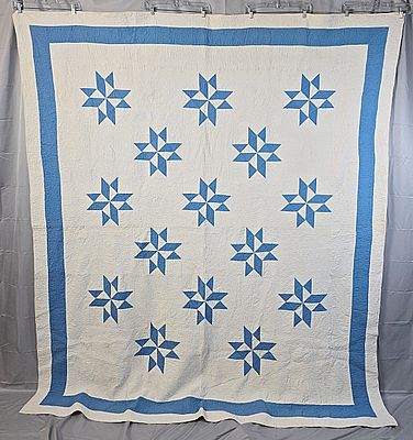 Vintage c1940 Pinwheel Star measuring 78 by 90 inches. It is comprised of 30 squares, 11 by 11 