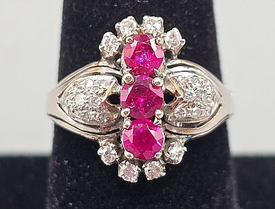 Vintage 18K Diamond and Ruby Ring. The lot includes a vintage late deco 18K white gold ring