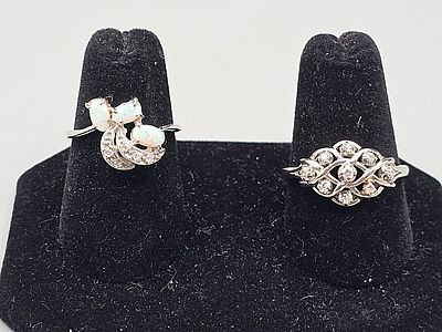 Pair of Vintage 14K Diamond Rings. The lot includes a pair of vintage 14K white gold and