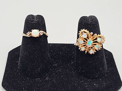 2 Vintage 10K Gold and Opal Rings. The lot includes a pair of vintage 10K yellow gold rings