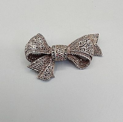 Large Sterling and Marcasite Bow Brooch. The lot includes a large 1.41'' x 2.5'' sterling
