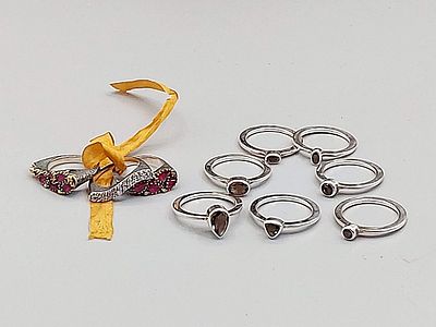 2 Sets of Sterling and Gemstone Stackable Rings. The lot includes two sets of stackable