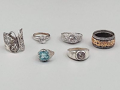 Group of 6 Sterling and CZ Rings. The lot includes a variety of 6 sterling and CZ rings.