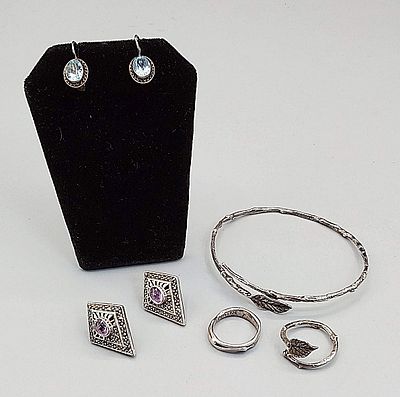 Group of Mixed Sterling Jewelry. The lot includes a mix of sterling silver jewelry. Featuring a