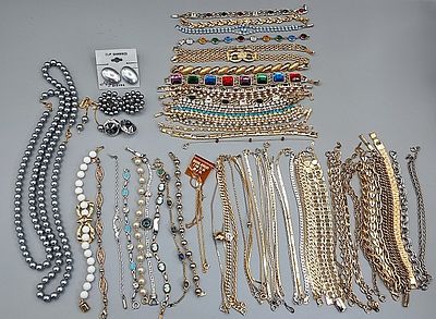 Gold and Silver Toned Bracelets with Accents. Grouping of gold and silver tone costume bracelets