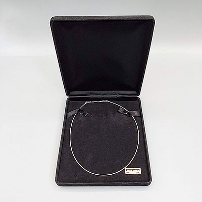 14K White Gold Necklace. Marked 14K 17.5" fine white gold necklace which includes a 1" extender