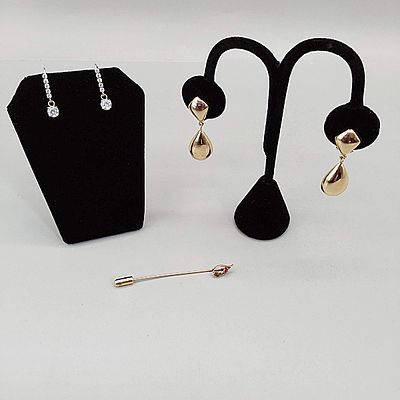 14K Earrings and Stick Pin. Two pairs of marked 14K earrings. The first pair is for pierced ears