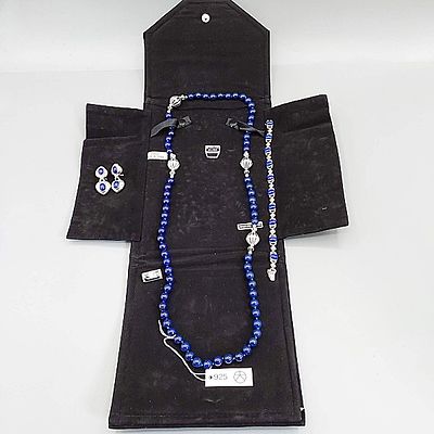 Sterling and Lapis Grouping. A 27” Lapis bead necklace with unmarked silver accents (Tag says