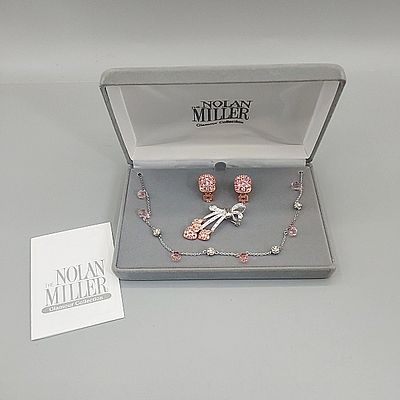 3 Pieces of Nolan Miller Jewelry. A 17” “Happily Ever After” necklace with rhinestone balls and