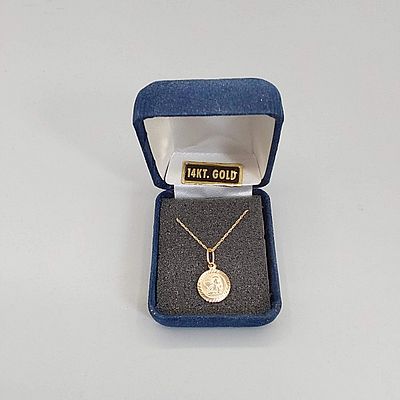 14K Chain with Cherub. A marked 14K 18" fine yellow-gold rope chain with a marked cherub pendant