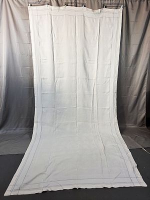 Vintage Paisley Damask Linen Tablecloth Set. There are 12 white linen damask napkins and a 