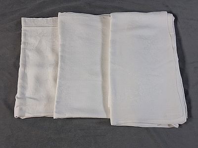3 Vintage Floral Damask Linen Tablecloths. There is a tablecloth that is 70"x76" with stripes 