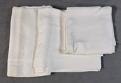 3 Vintage Linen Damask Tablecloths. A linen damask tablecloth is included and it measures 