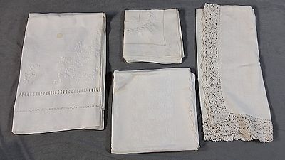 Group of 4 Vintage White Linen Tablecloths. There is a plain linen tablecloth that is 30.5"x 