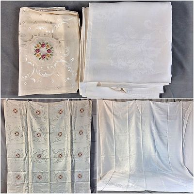 Pair of Vintage Damask Linen Tablecloths. There is a white linen damask tablecloth that 