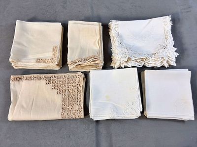 4 Vintage White Linen Napkins. There are 4 sets of linen napkins that are included with one 