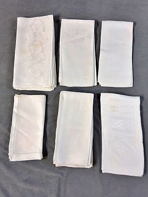 Group of 6 Sets of Vintage Damask Napkins. There is a set of 2 napkins with roses on them as a 
