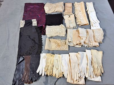 Lace Trimmings, Clothing Fragments, Gloves, and More. There are 13 pairs of gloves with them 