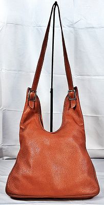 Hermes Evergreen Massai 32. This Hermes bag is made from brown grained calfskin leather. The 