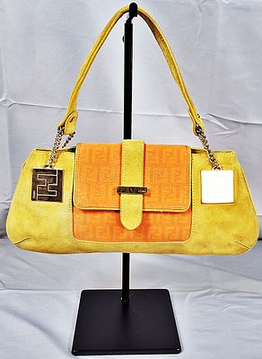 Fendi Selleria Shoulder Bag. This is a Fendi Selleria suede and jacquard shoulder bag. The bag 