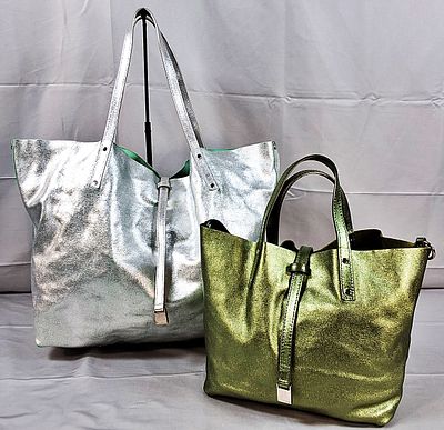 2 Metallic Tiffany and Co Totes. There are 2 Tiffany and Co tote bags included with one being 