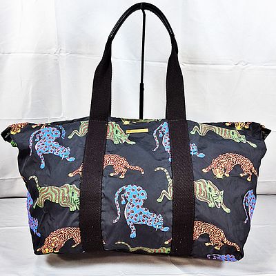 Stella McCartney Travel Bag. This is a Stella McCartney travel bag with several big cats from 
