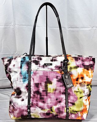 Tumi Multicolor Tote Bag. This is a Tumi multicolor abstract large voyager tote. It is made 