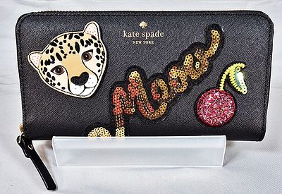 Kate Spade Wristlet. This is a Kate Spade Run Wild Leopard Neda Wristlet. The wristlet is made 