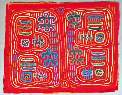 Guna Mola Panel with Stylized Boot Iconography. Panama (Guna Yala), circa 1970s14.5 &times; 18 inchesA 