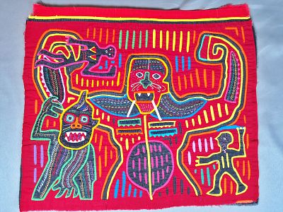 Guna Mola Panel with Mythic Figure Grasping Human. Panama (Guna Yala), circa 1970s14 &times; 16.5 