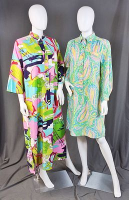 2 Vintage c1970s Conversational Muumuus. There are 2 vintage 1970s cotton muumuus with each 