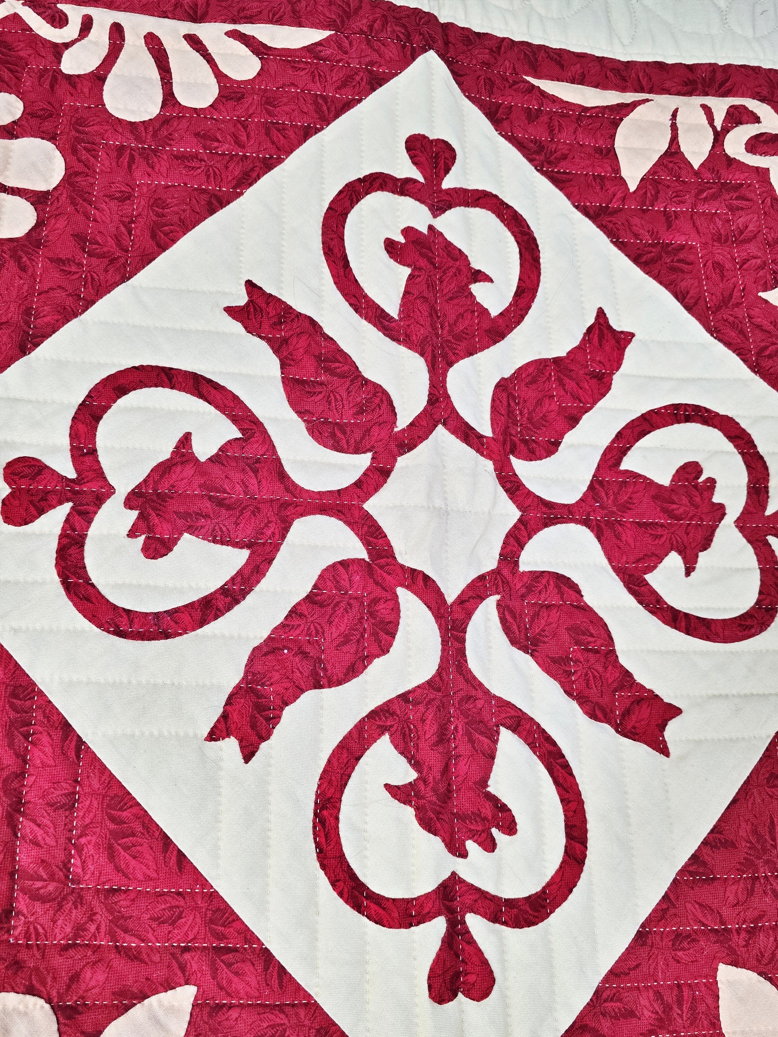 Cranberry Arabesque Quilt by Frances Abell Brand