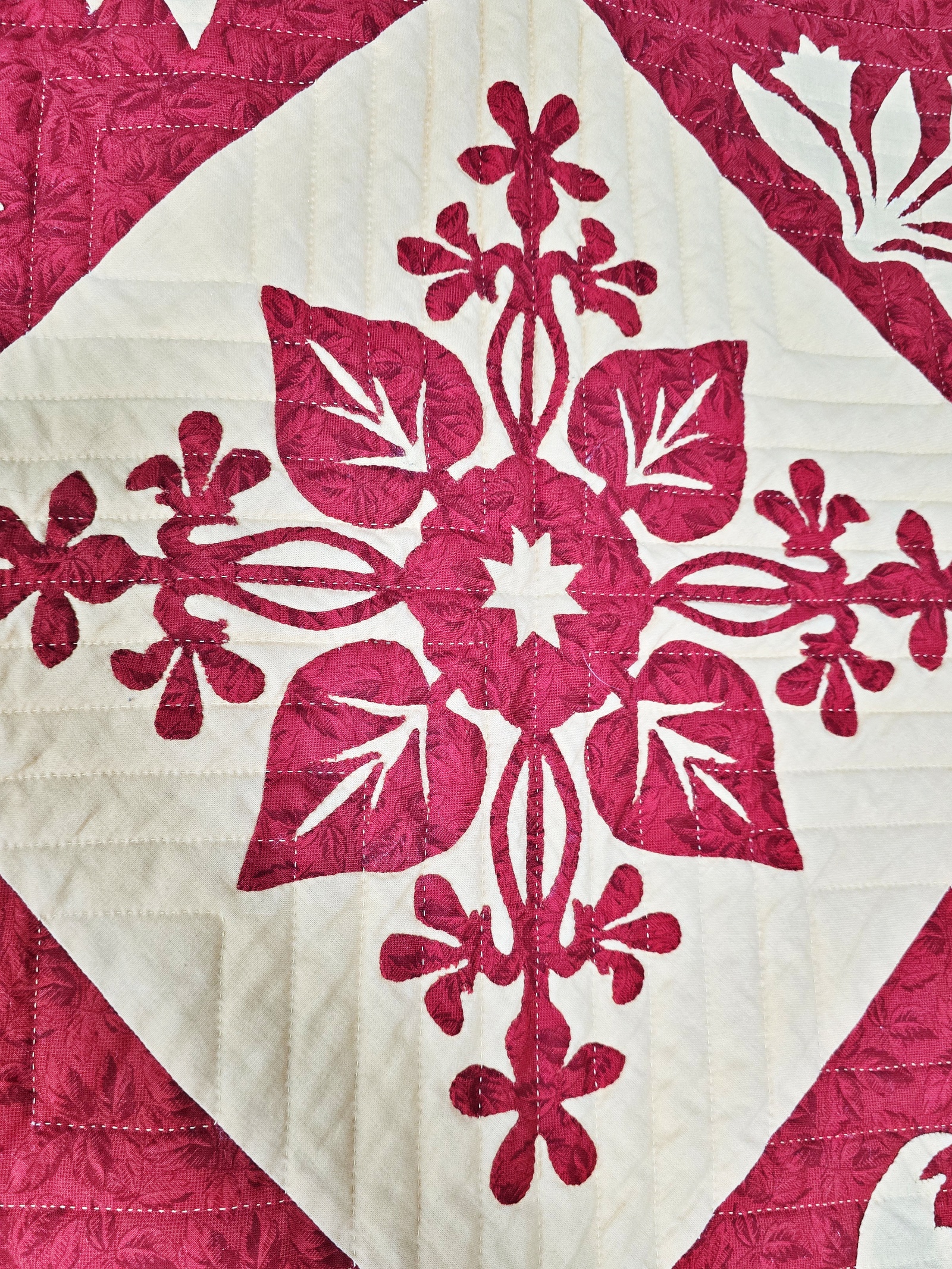 Cranberry Arabesque Quilt by Frances Abell Brand