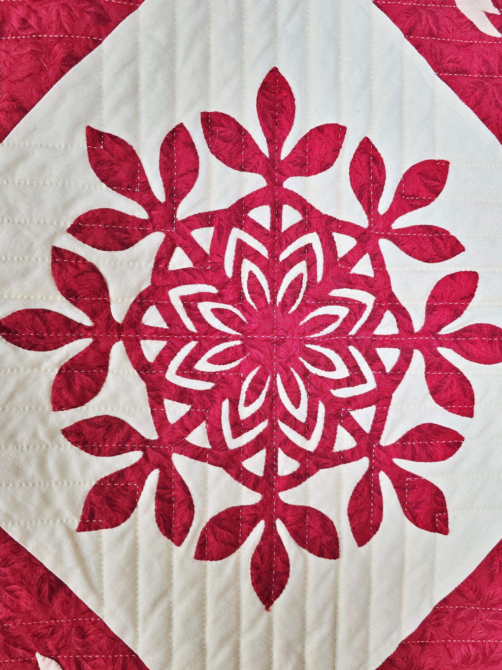 Cranberry Arabesque Quilt by Frances Abell Brand