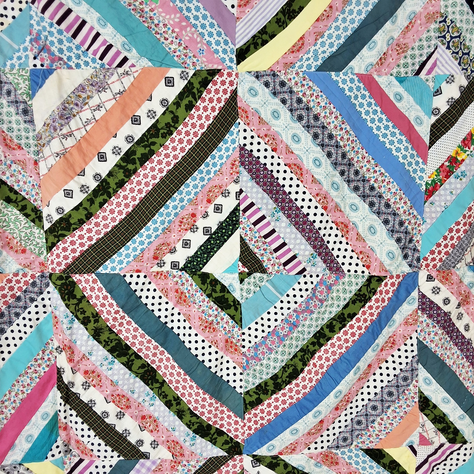 Vintage c1960 String Pieced Summer Quilt measuring 73 by 93 inches. It is comprised of 42 blocks, 11.5 by 11.5 inches, set straight, 6 by 7,