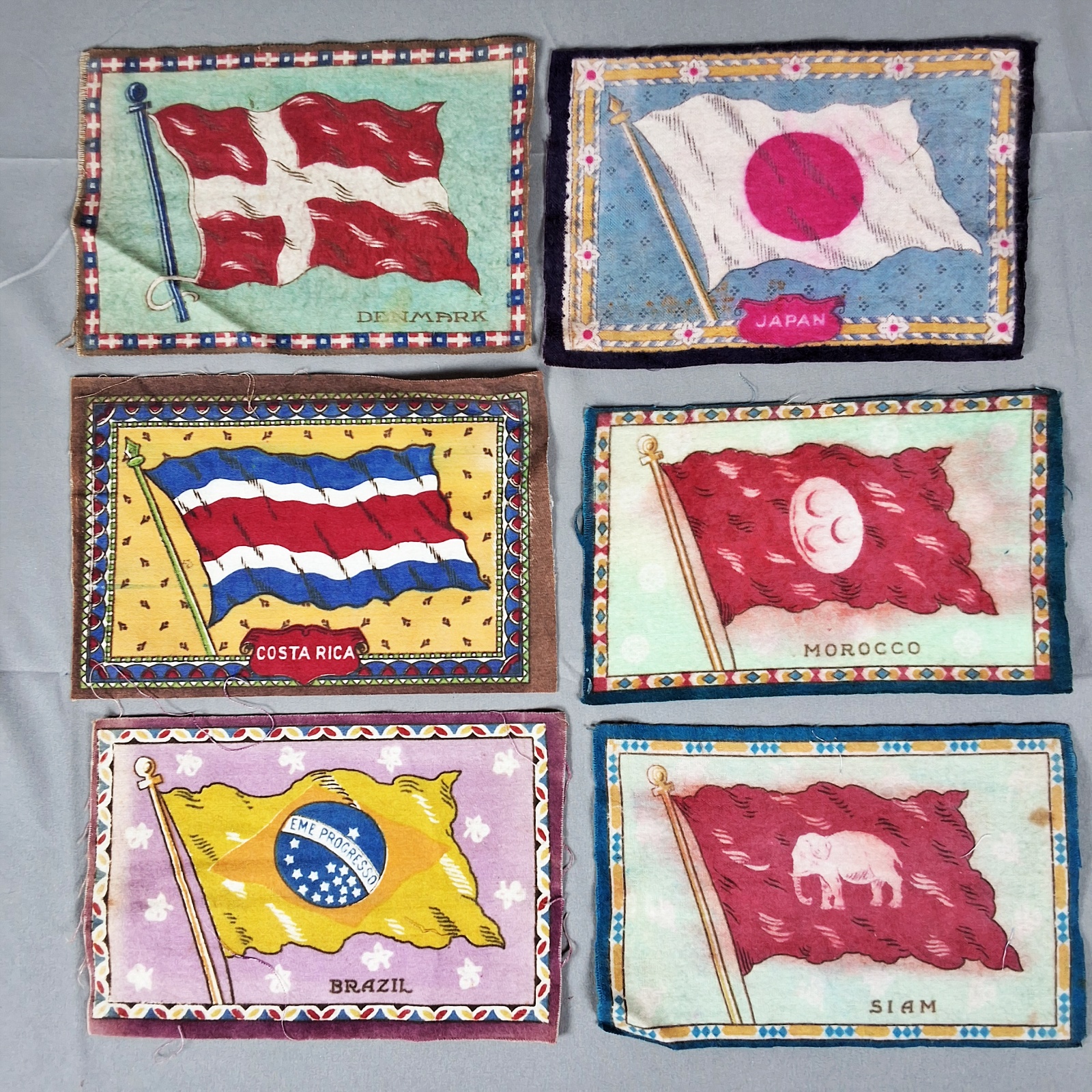 Group of 36 Antique Cigar Flannel Flags