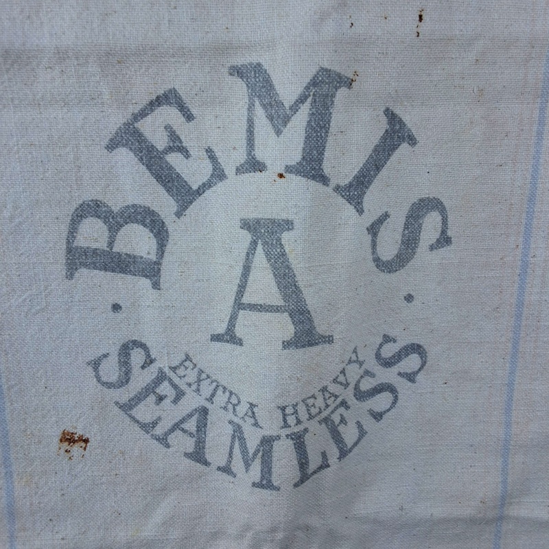 Group of 7 Complete Vintage Advertising Feedsacks & Tablecloth