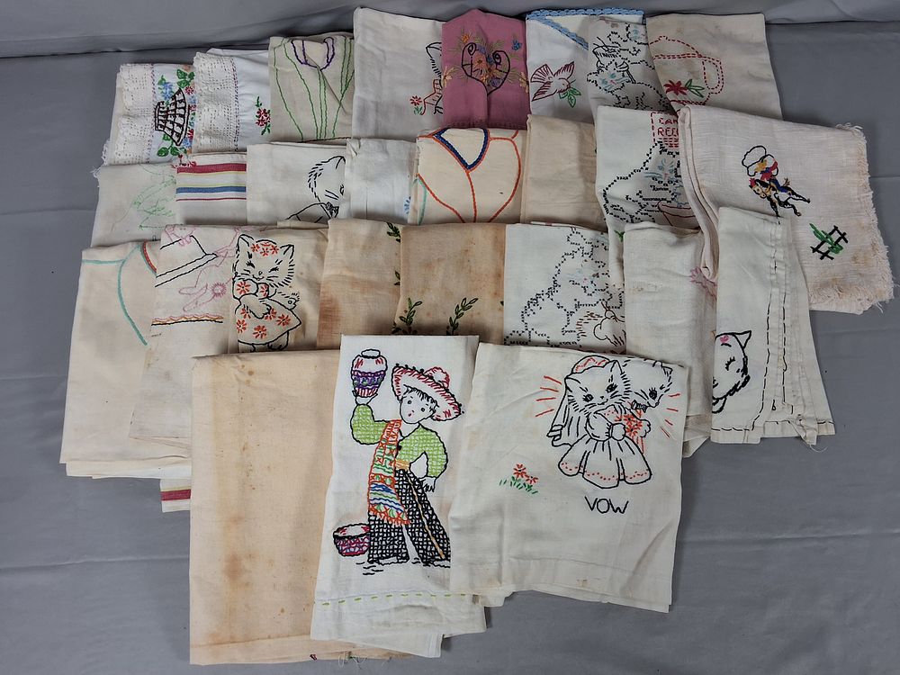 Lot 19: 27 Embroidered Pillowcases and Textiles