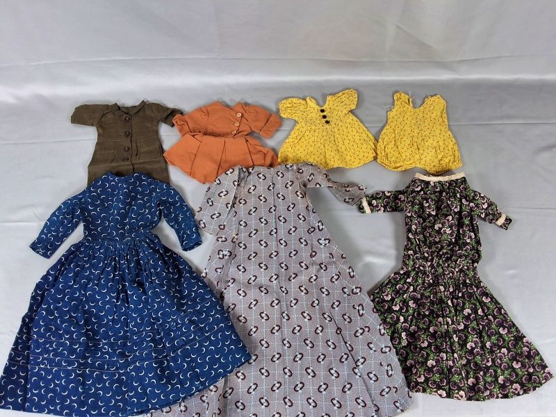 Lot 22: 7 Antique and Vintage Doll Clothing