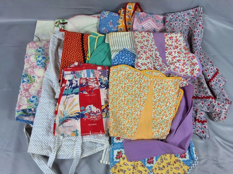 Lot 22: 15 Conversational Aprons