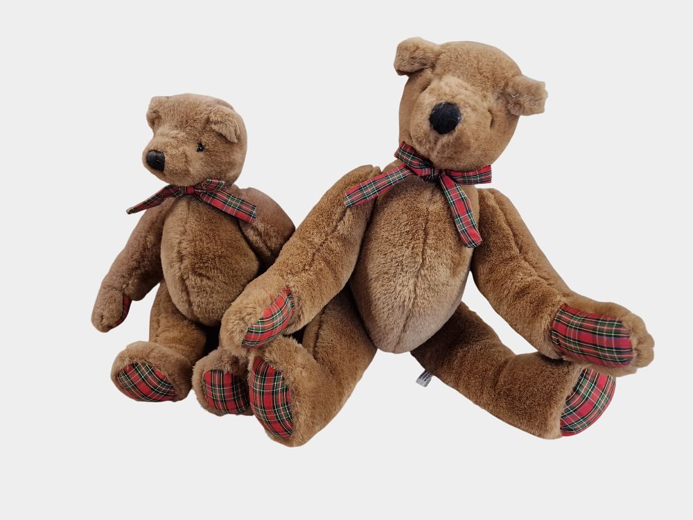 Lot 595: A Pair of Debenhams Teddy Bears with Tartan Accents