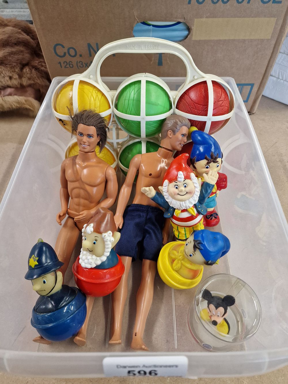 Lot 596: An Assortment of Vintage and Modern Toys including Disney Figures, Male Fashion Dolls and a Boules Set