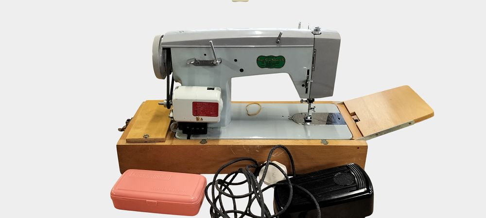 Lot 459: Vintage Norger Sewing Machine Co. Ltd. Zig-Zag Sewing Machine with Case and Accessories