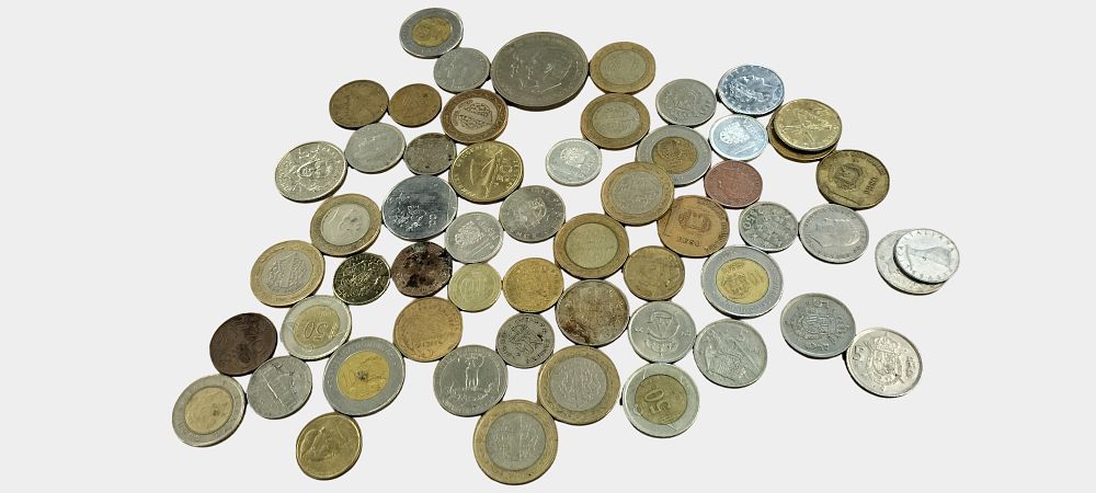 Lot 462: A Collection of World Coins and Commemoratives including UK, ES, TR, and DO