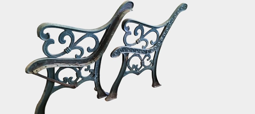 Lot 467: A Pair of Victorian Style Cast Iron Fleur-de-lis Garden Bench Ends