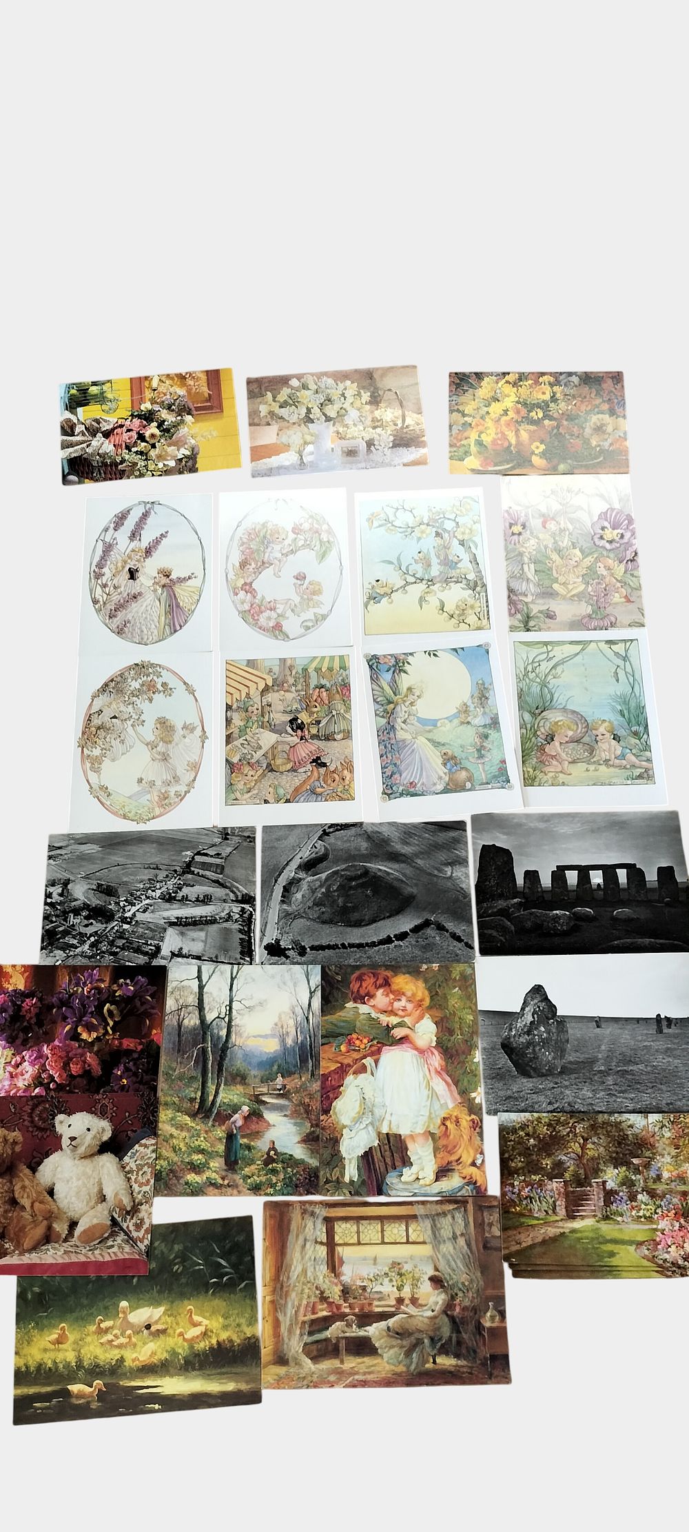 Lot 486: A Collection of 21 Postcards and Art Cards Featuring Margaret Tarrant Fairy Illustrations and British Heritage Sites