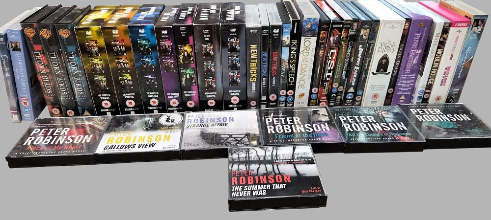 Lot 373: A Collection of Television Series DVD Box Sets, Feature Films, VHS Tapes, and Audiobooks
