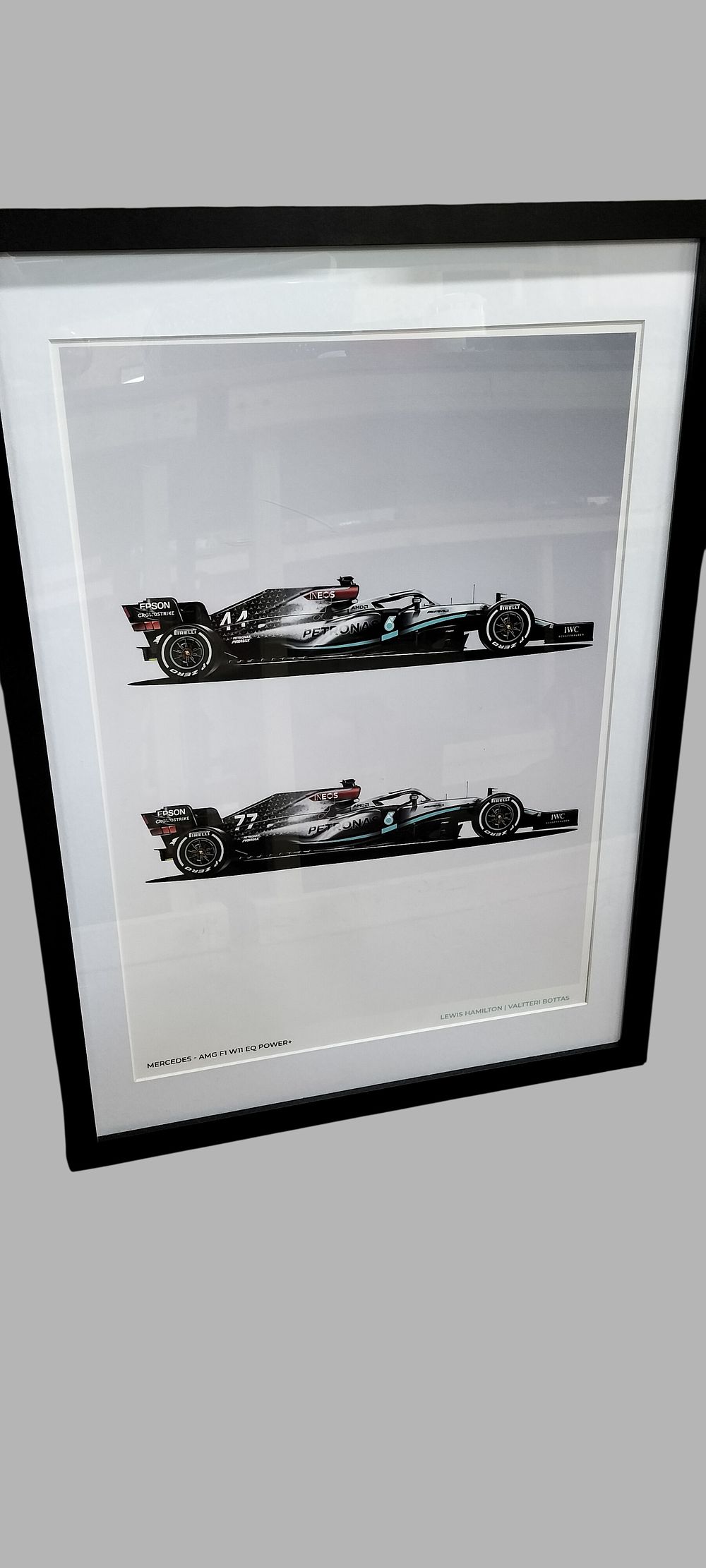 Lot 377: Framed Mercedes-AMG Petronas F1 W11 EQ Performance Commemorative Print