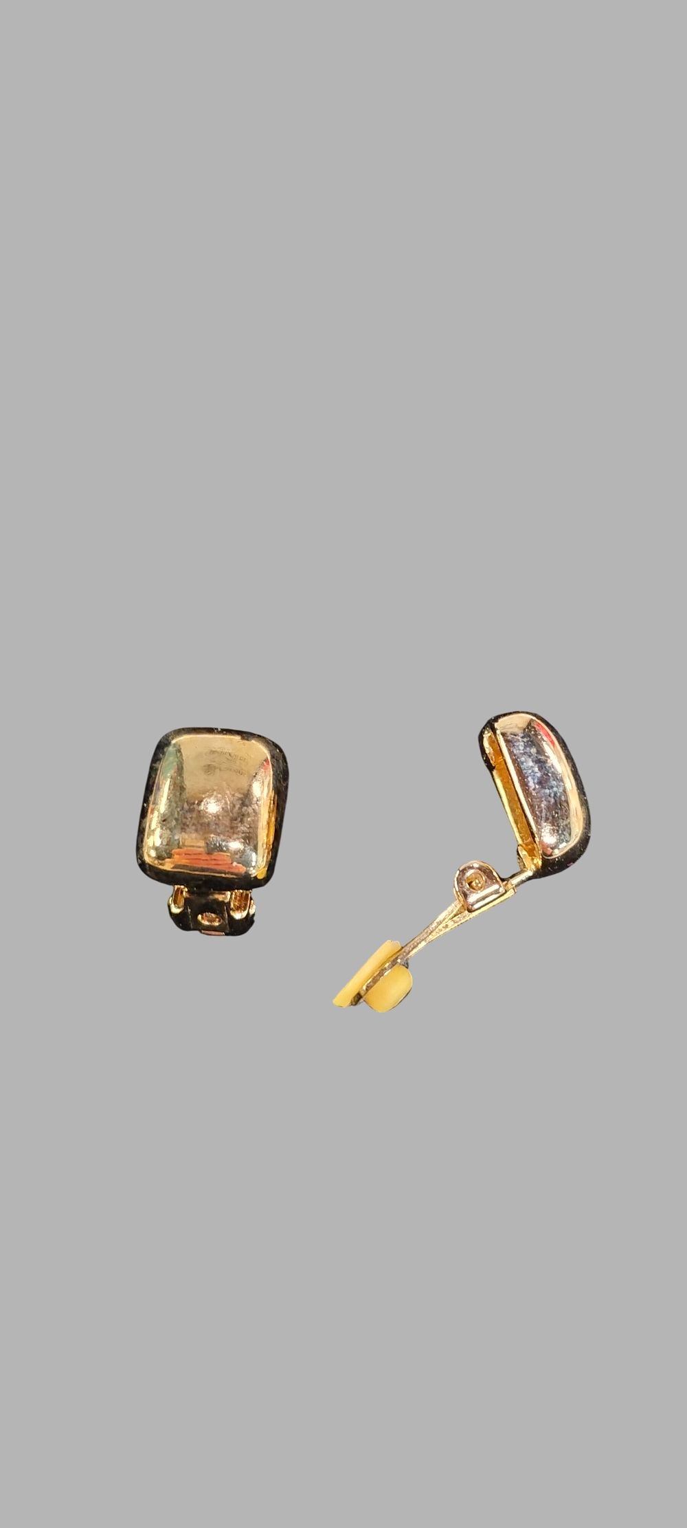 Lot 379: A Pair of Chanel Vintage Gold Tone Puffed Square Clip On Earrings