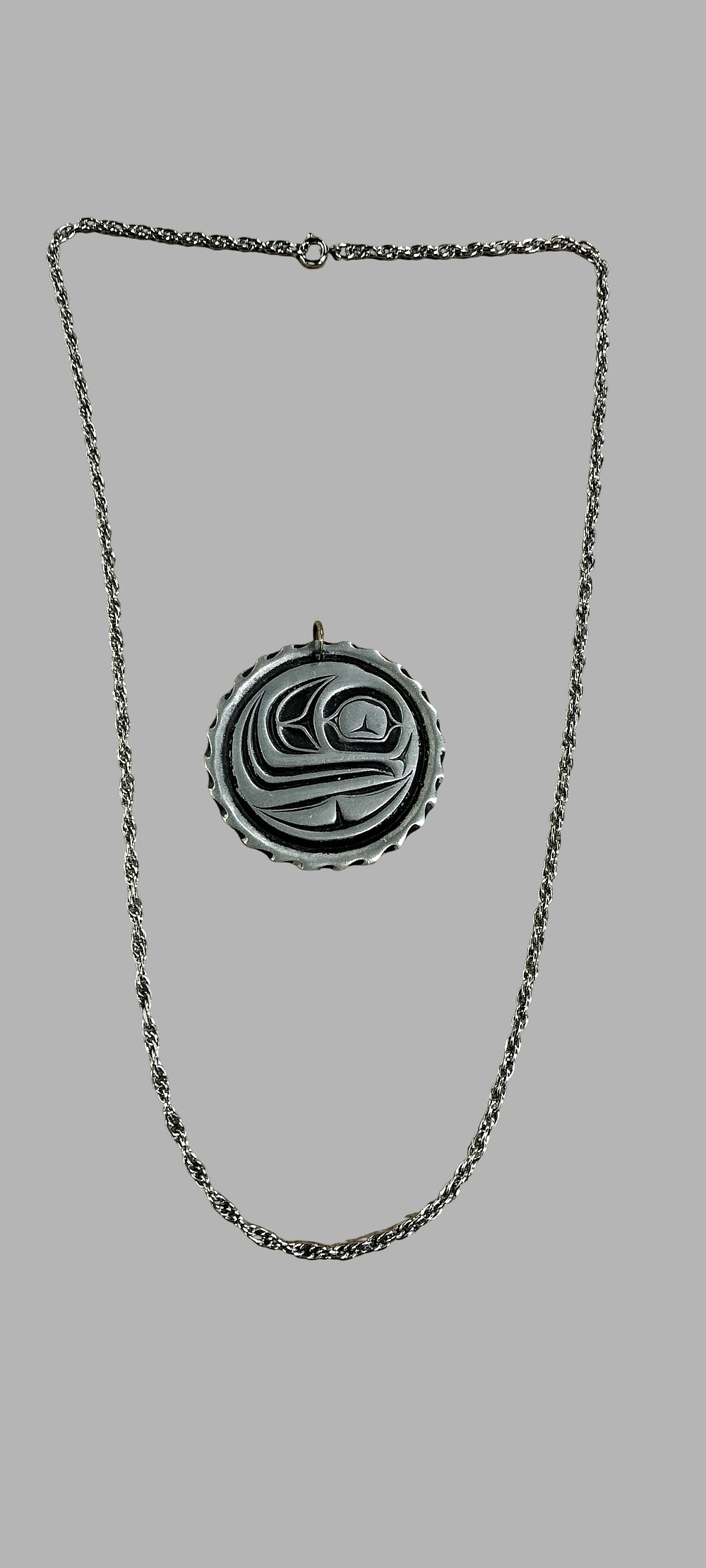Lot 383: Silver-tone Avatar Water Tribe Symbol Pendant Necklace